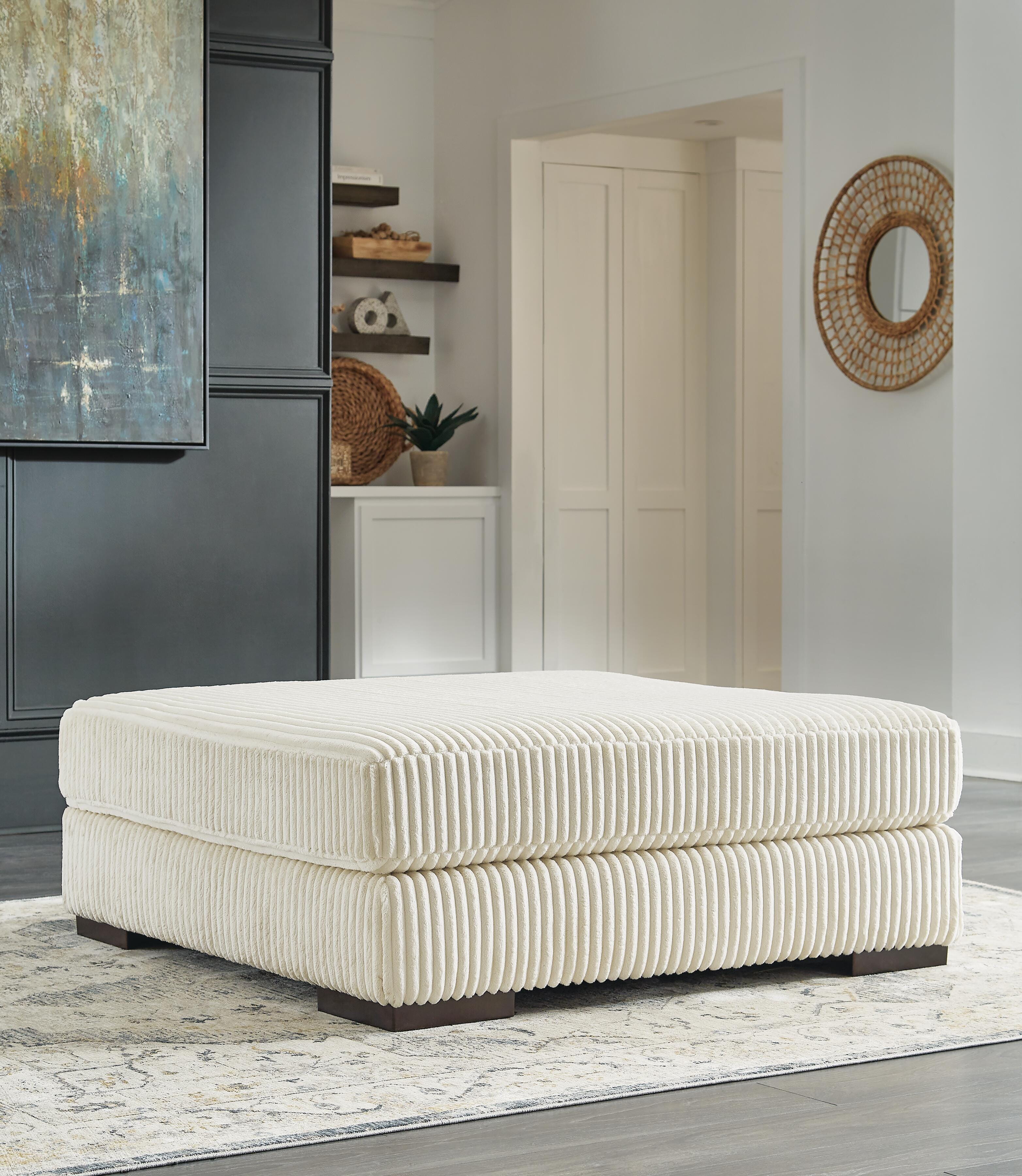 Lindyn 2-Piece Sectional, Chaise and Oversized Ottoman in Ivory