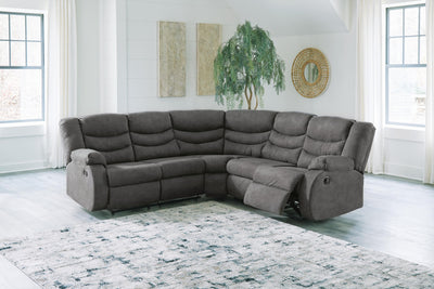 Partymate 2-Piece Reclining Sectional in Slate Faux Leather