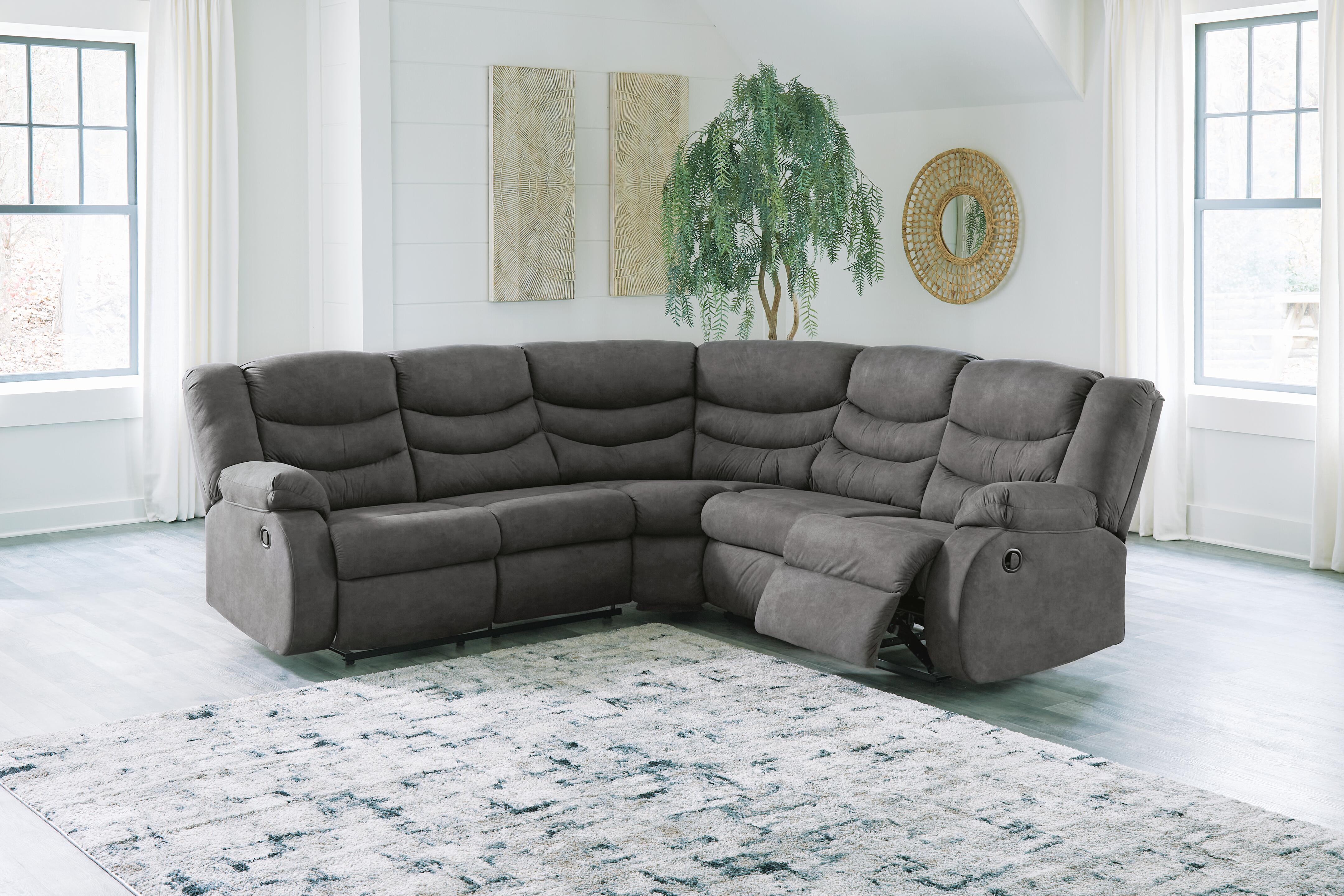 Partymate 2-Piece Reclining Sectional in Slate Faux Leather