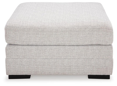 Koralynn 3-Piece Sectional and Oversized Accent Ottoman in Stone