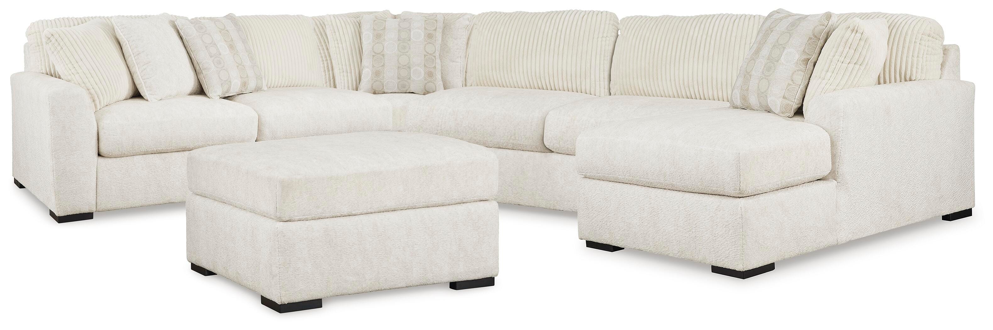 Chessington 4-Piece Sectional and Oversized Accent Ottoman in Ivory