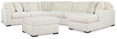 Chessington 4-Piece Sectional and Oversized Accent Ottoman in Ivory