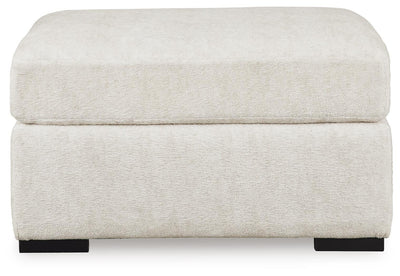 Chessington 2-Piece Sectional and Ottoman in Ivory