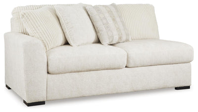 Chessington 2-Piece Sectional and Ottoman in Ivory