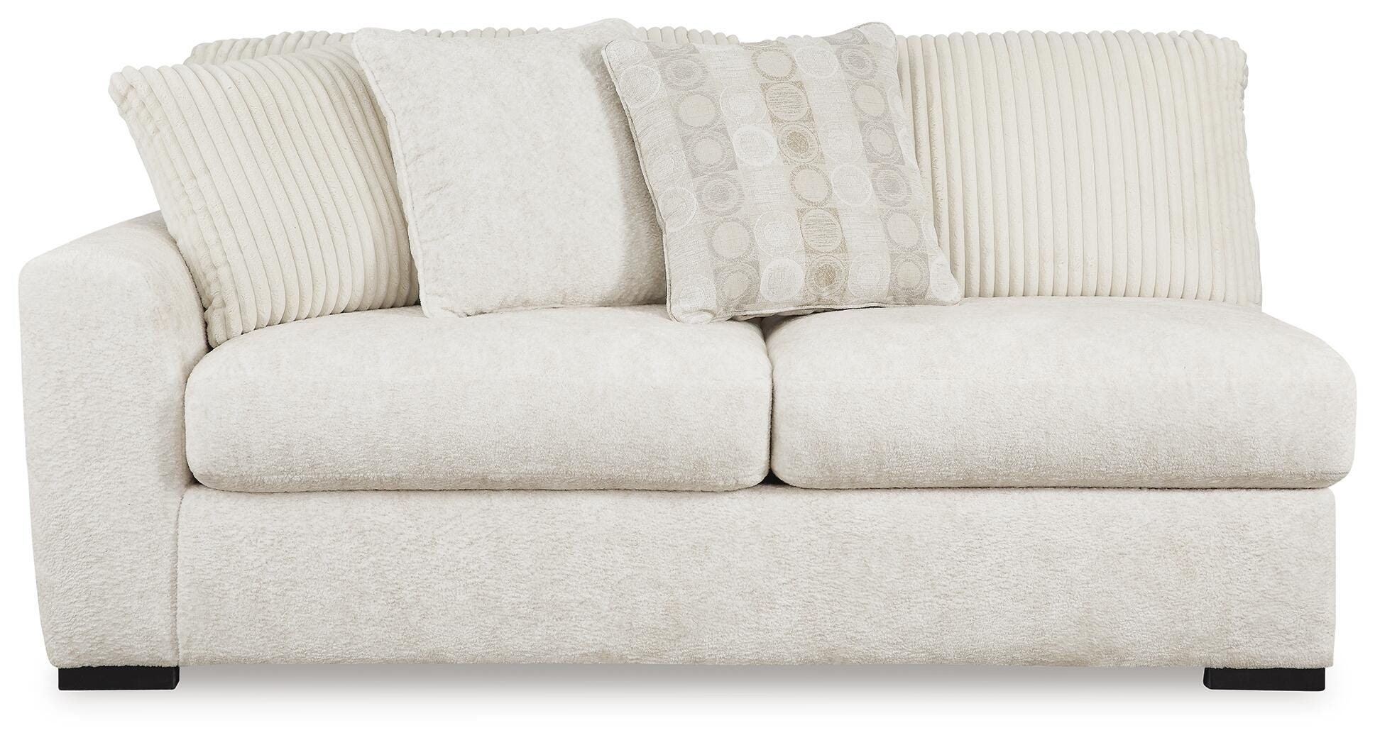 Chessington 4-Piece Sectional and Oversized Accent Ottoman in Ivory