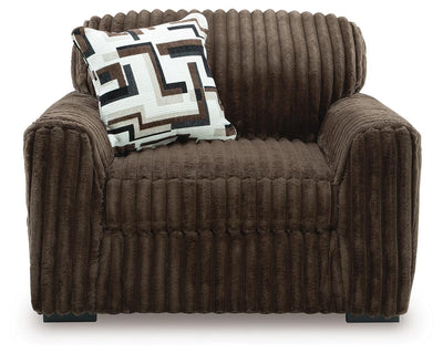 Midnight-Madness 4-Piece Sectional with Chaise, Oversized Chair and Ottoman in Chocolate